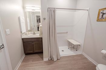 Roll in shower w/ built in shower seat